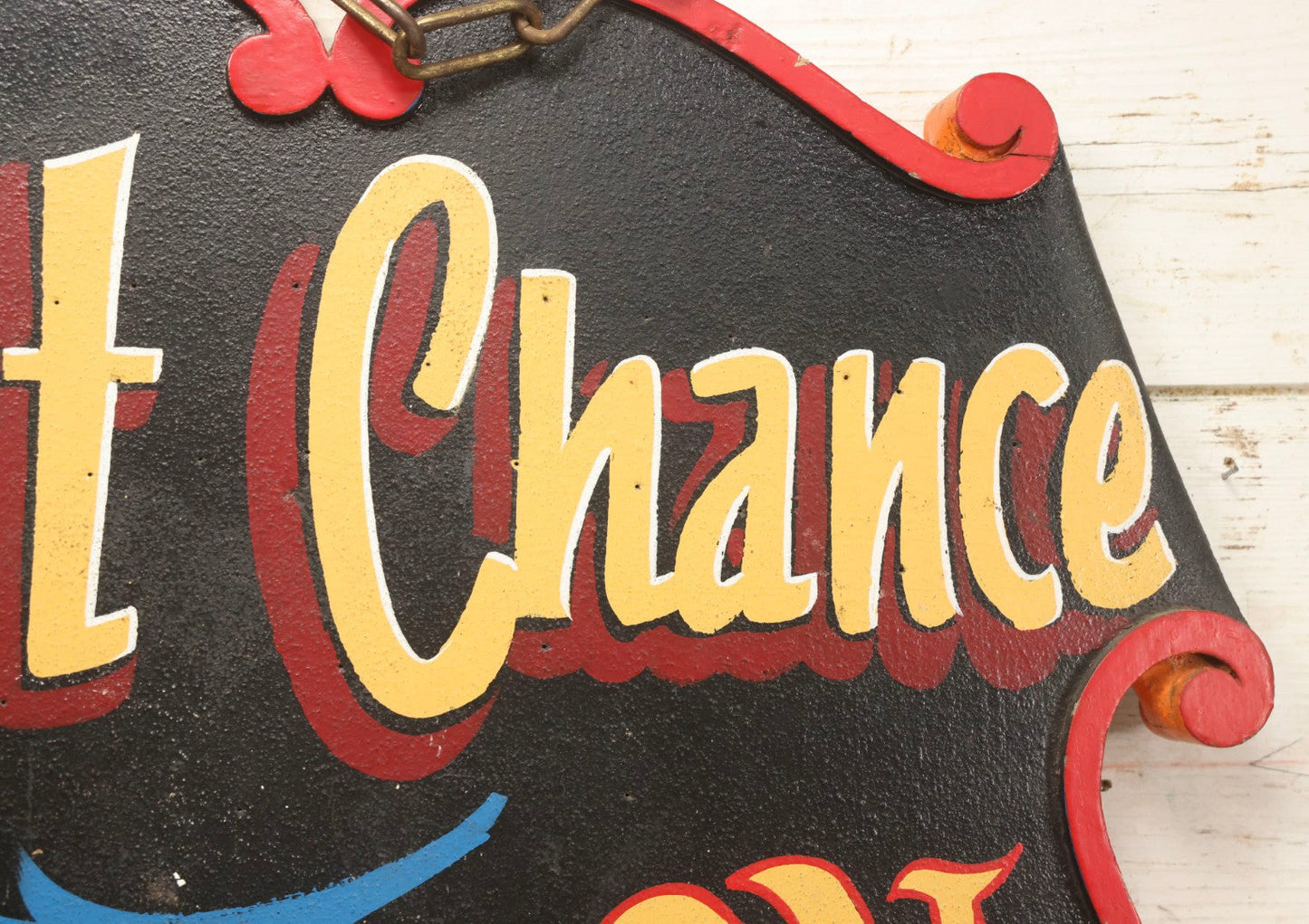 Lot 034 - Double-Sided Wooden Shield-Form Sign With Raised Letters “Burdett 18 College” And Modern Repurposed Side Painted “Last Chance Saloon," Note Missing Corner Scroll Piece And Large Crack In Other Scroll Corner, 25-1/2" x 26"