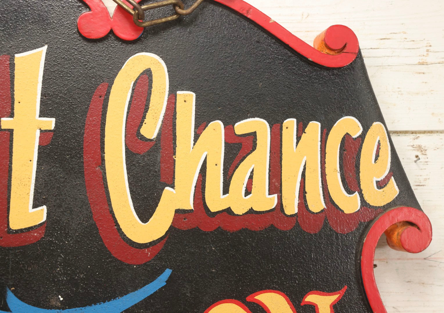 Lot 034 - Double-Sided Wooden Shield-Form Sign With Raised Letters “Burdett 18 College” And Modern Repurposed Side Painted “Last Chance Saloon," Note Missing Corner Scroll Piece And Large Crack In Other Scroll Corner, 25-1/2" x 26"