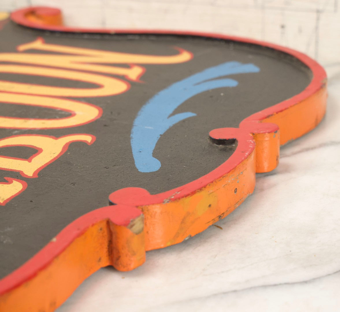 Lot 034 - Double-Sided Wooden Shield-Form Sign With Raised Letters “Burdett 18 College” And Modern Repurposed Side Painted “Last Chance Saloon," Note Missing Corner Scroll Piece And Large Crack In Other Scroll Corner, 25-1/2" x 26"