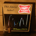 Lot 035 - Vintage Miller High Life Beer Metal And Plastic Light-Up Sign With Black Surround, Circa 1960s