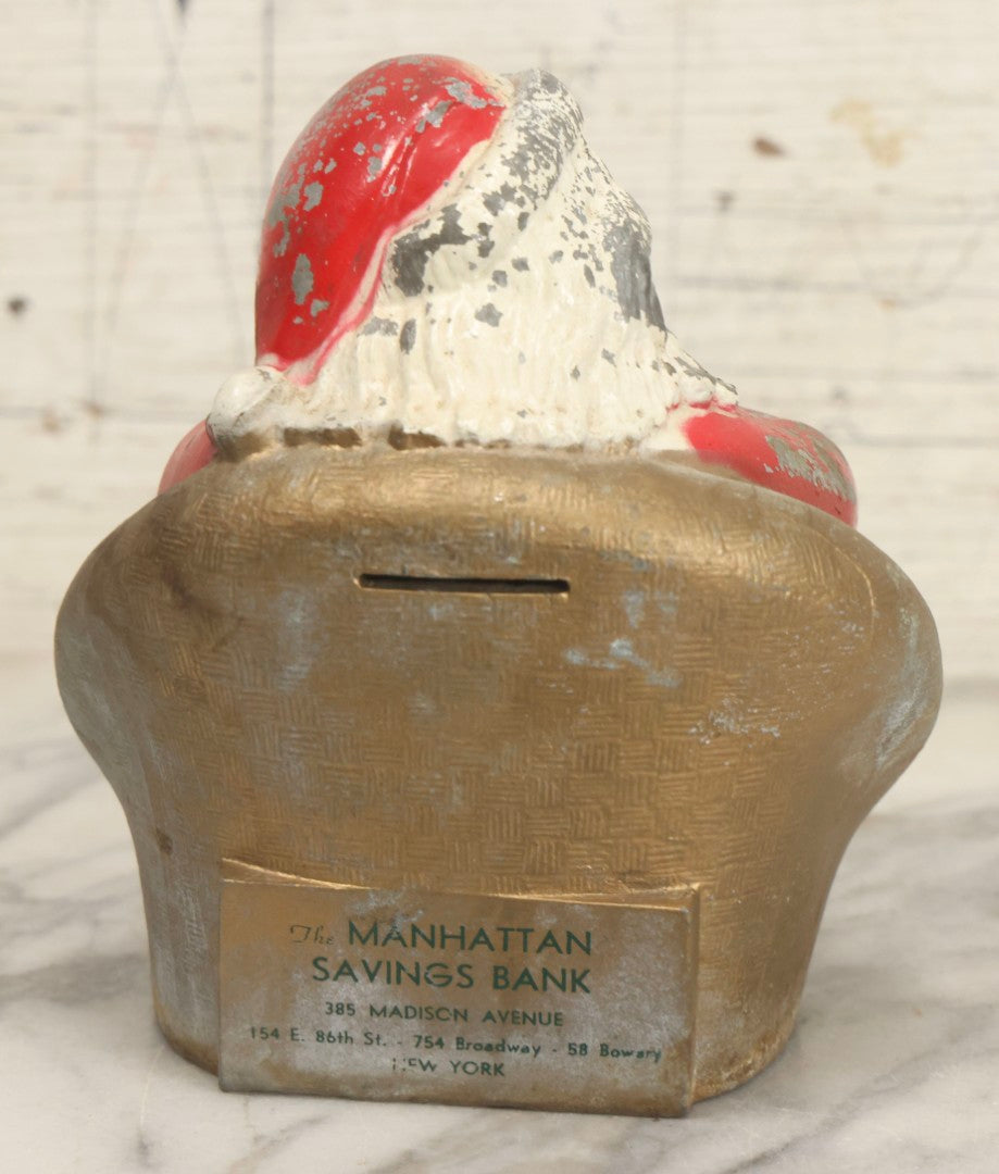 Lot 051 - Vintage Painted Pot Metal Sleeping Santa Claus Christmas Still Coin Bank Advertising Manhattan Savings Bank, New York, New York, 6-1/4" H