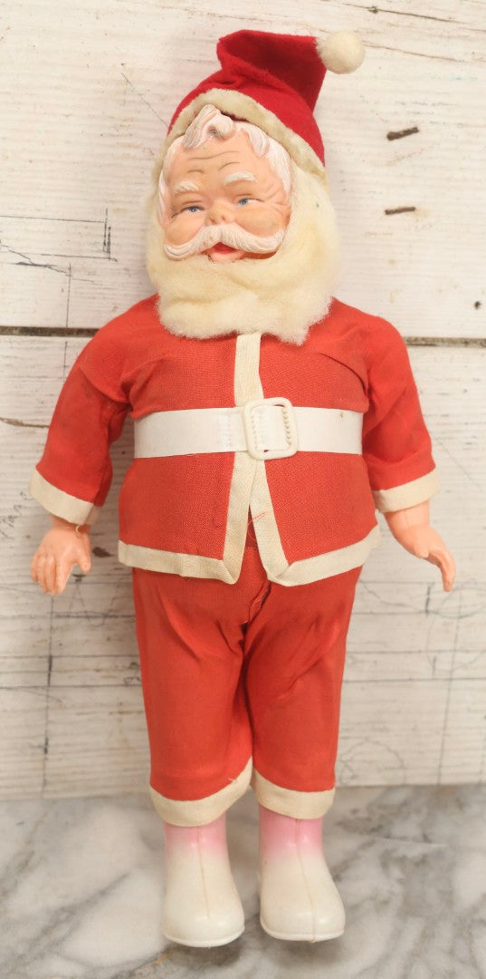 Lot 052 - Pair Of Vintage Plastic Santa Claus Christmas Dolls With Fabric Clothing, Circa 1960s 14-1/2" H And 10-1/2" H
