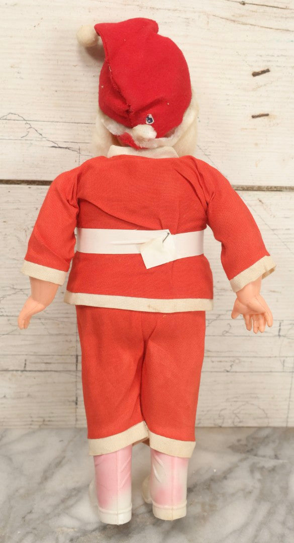 Lot 052 - Pair Of Vintage Plastic Santa Claus Christmas Dolls With Fabric Clothing, Circa 1960s 14-1/2" H And 10-1/2" H