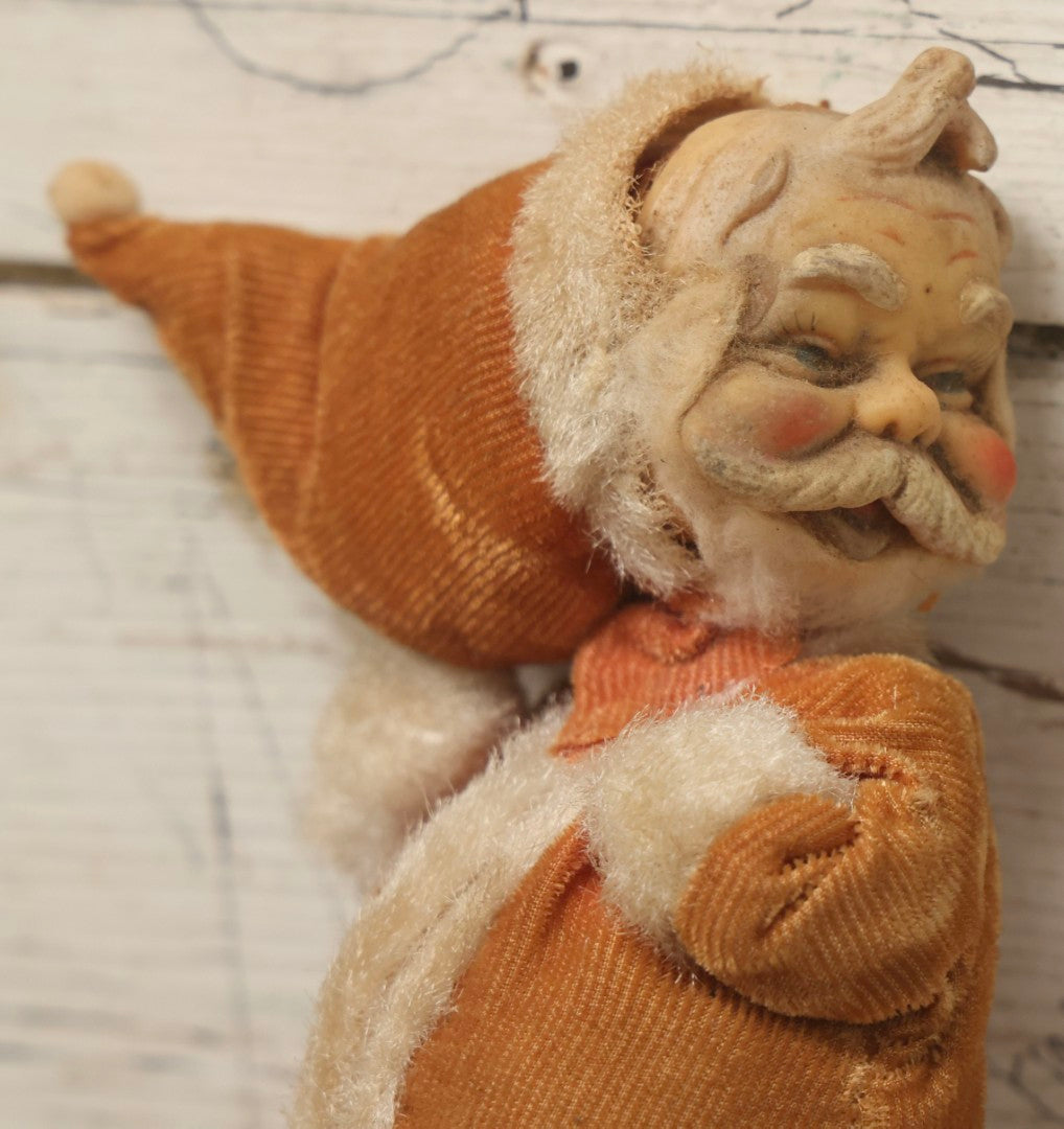 Lot 052 - Pair Of Vintage Plastic Santa Claus Christmas Dolls With Fabric Clothing, Circa 1960s 14-1/2" H And 10-1/2" H