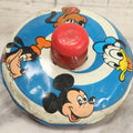 Lot 055 - Vintage Tin Lithographed Disney Characters Pump Action Toy Spinning Top With Mickey Mouse, Goofy, Pluto, And Donald Duck, Chein Playthings, 1973, 6-3/4" Diameter