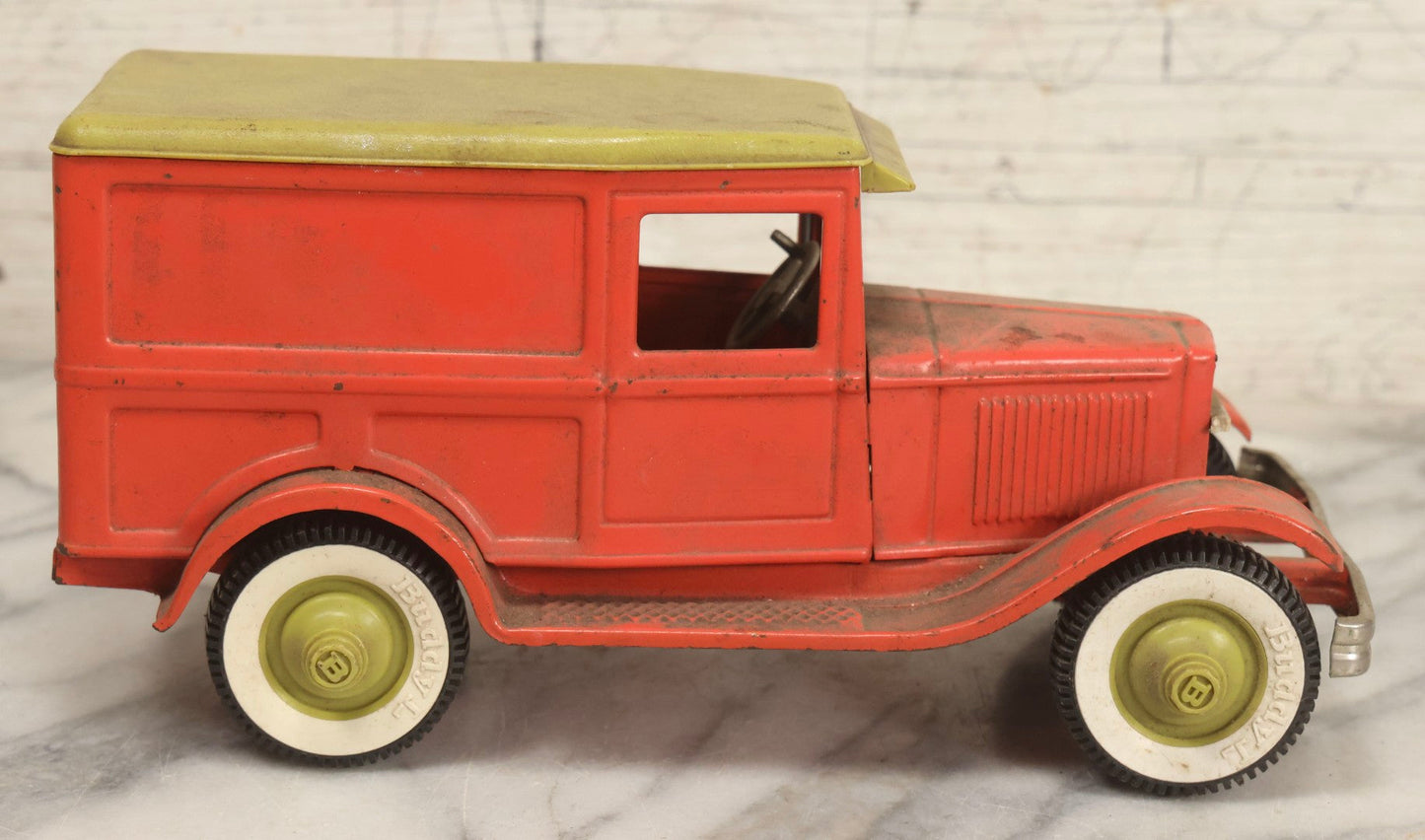 Lot 056 - Vintage Buddy L Ol' Buddy's Pie Wagon Pressed Steel Panel Truck No. 4243, Pink With Green Roof, Incomplete, Poor Condition, 10-1/4" L