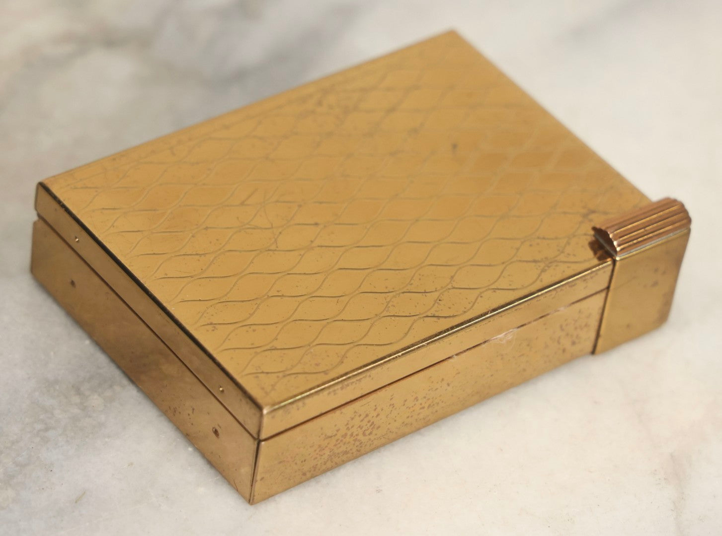 Lot 059 - Vintage Volupte Brass Makeup Compact With Pull-Out Lipstick Holder And Wind Up Musical Box, Made In U.S.A..