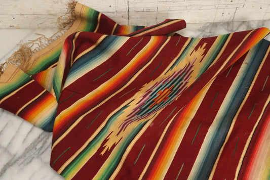 Lot 065 - Vintage Mexican Serape Woven Blanket With Multicolor Stripes And Central Diamond Motif, 53-1/2" x 26-1/4"
