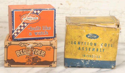Lot 066 - Grouping Of Three Vintage Advertising Cardboard Boxes With Contents Including Daisy Red Ryder B.B.s Shakespeare Fishing Reel, And Ford Ignition Coil