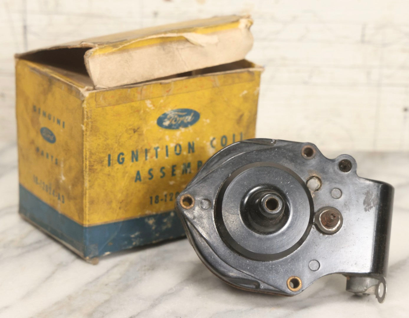 Lot 066 - Grouping Of Three Vintage Advertising Cardboard Boxes With Contents Including Daisy Red Ryder B.B.s Shakespeare Fishing Reel, And Ford Ignition Coil