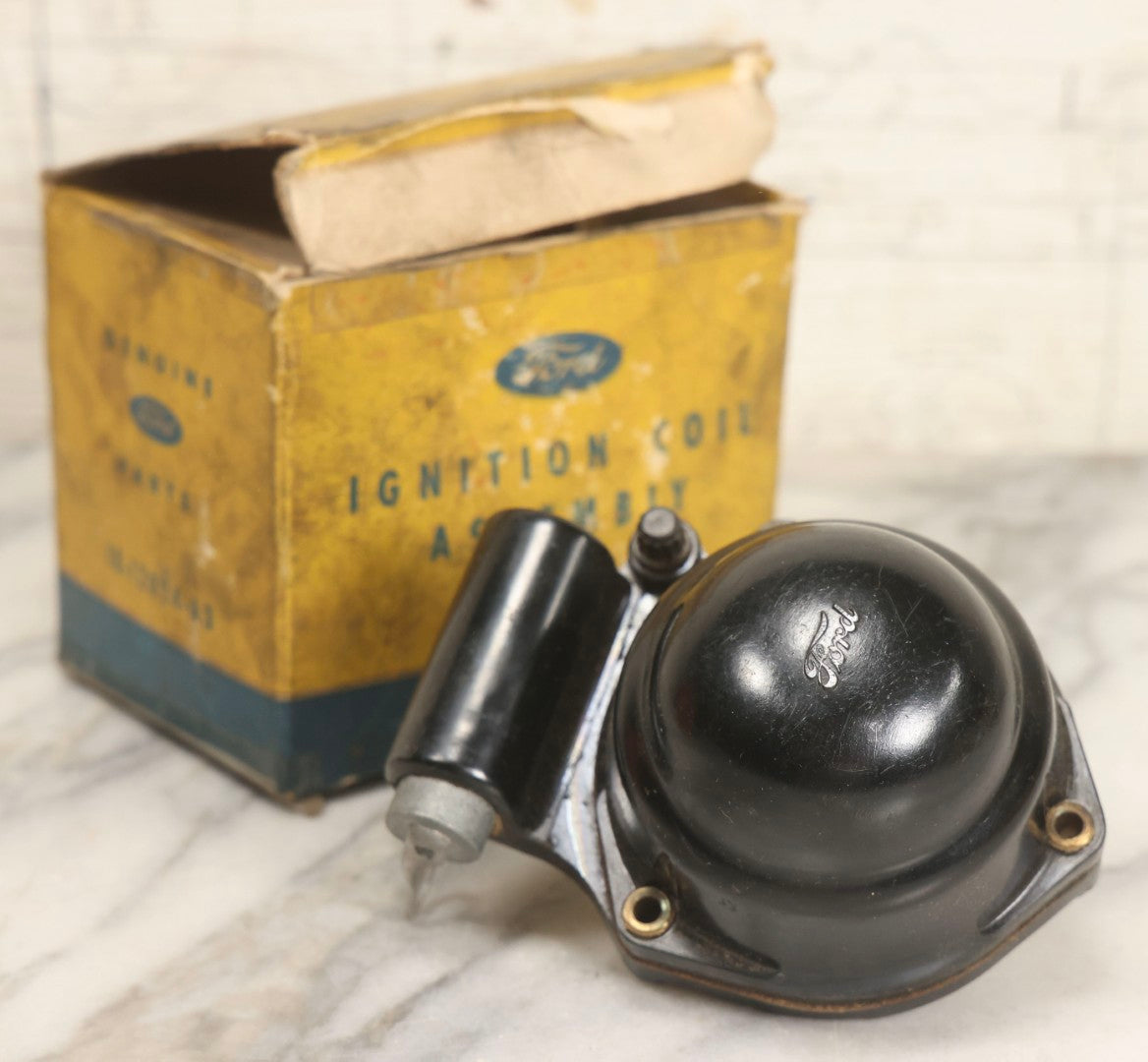 Lot 066 - Grouping Of Three Vintage Advertising Cardboard Boxes With Contents Including Daisy Red Ryder B.B.s Shakespeare Fishing Reel, And Ford Ignition Coil