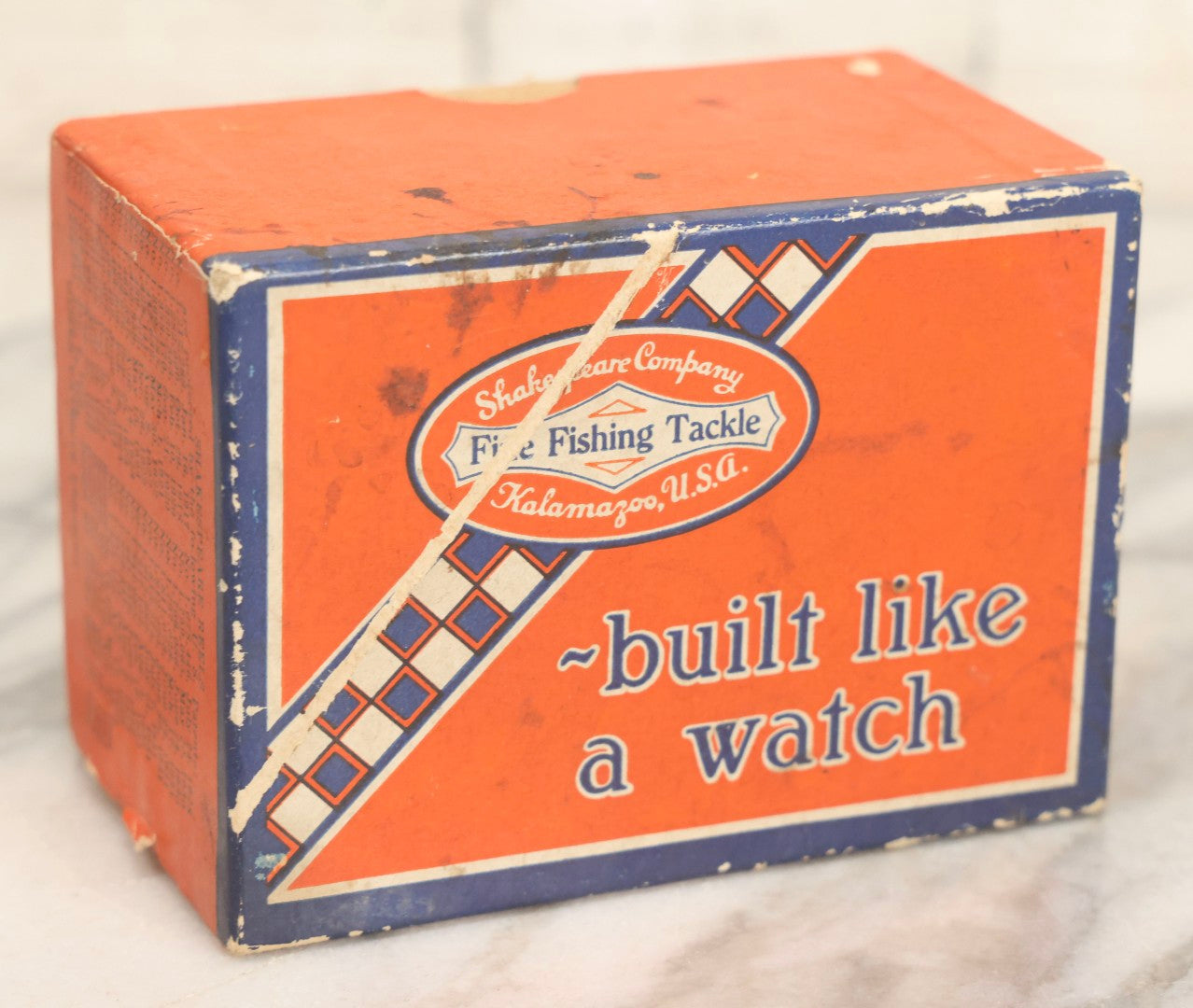 Lot 066 - Grouping Of Three Vintage Advertising Cardboard Boxes With Contents Including Daisy Red Ryder B.B.s Shakespeare Fishing Reel, And Ford Ignition Coil