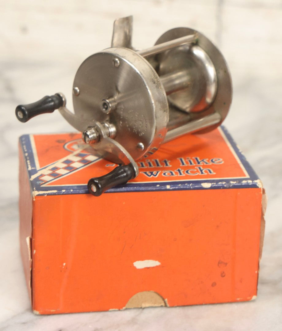 Lot 066 - Grouping Of Three Vintage Advertising Cardboard Boxes With Contents Including Daisy Red Ryder B.B.s Shakespeare Fishing Reel, And Ford Ignition Coil
