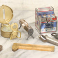 Lot 067 - Grouping Of Eleven Vintage Metal Smalls Including Compass, Wick Trimmer, Measuring Tools, Advertising Opener, Jewelry, Padlock, Tin Toy Bank, And Miniatures