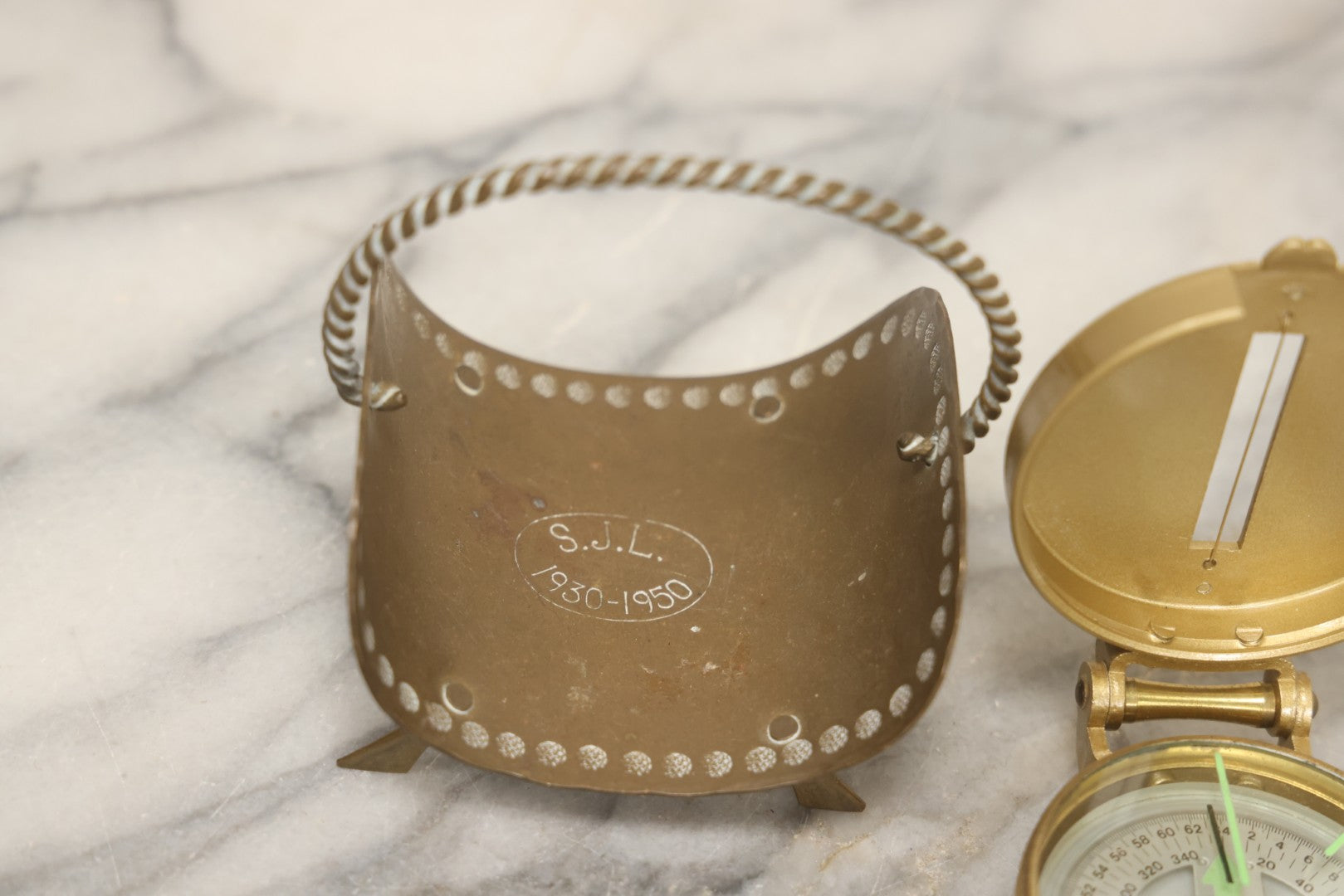 Lot 067 - Grouping Of Eleven Vintage Metal Smalls Including Compass, Wick Trimmer, Measuring Tools, Advertising Opener, Jewelry, Padlock, Tin Toy Bank, And Miniatures