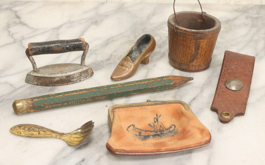 Lot 068 - Grouping Of Seven Mixed Vintage Smalls Including Miniature Shoe, Coin Purse, Mini Cast Iron Sad Iron, Jumbo Fitchburg, Mass Souvenir Pencil, Key Holder, And Advertising Spoon