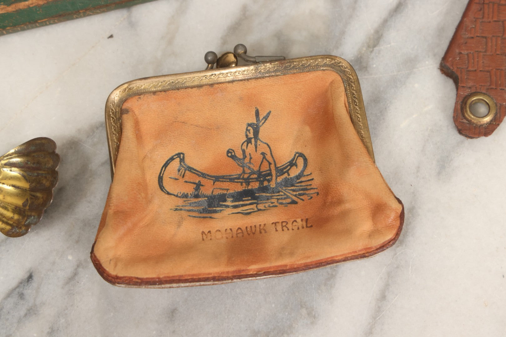 Lot 068 - Grouping Of Seven Mixed Vintage Smalls Including Miniature Shoe, Coin Purse, Mini Cast Iron Sad Iron, Jumbo Fitchburg, Mass Souvenir Pencil, Key Holder, And Advertising Spoon