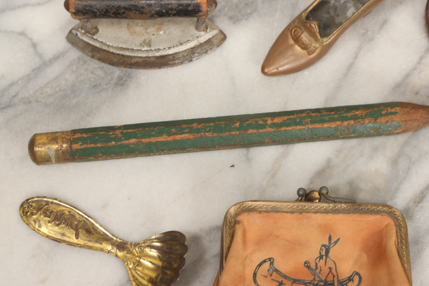 Lot 068 - Grouping Of Seven Mixed Vintage Smalls Including Miniature Shoe, Coin Purse, Mini Cast Iron Sad Iron, Jumbo Fitchburg, Mass Souvenir Pencil, Key Holder, And Advertising Spoon