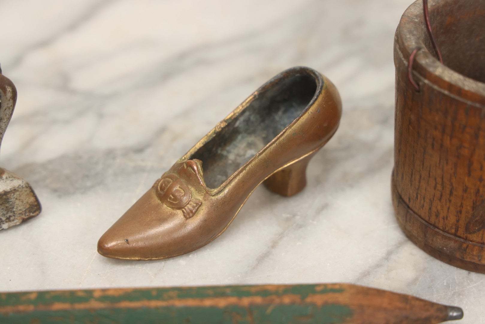 Lot 068 - Grouping Of Seven Mixed Vintage Smalls Including Miniature Shoe, Coin Purse, Mini Cast Iron Sad Iron, Jumbo Fitchburg, Mass Souvenir Pencil, Key Holder, And Advertising Spoon