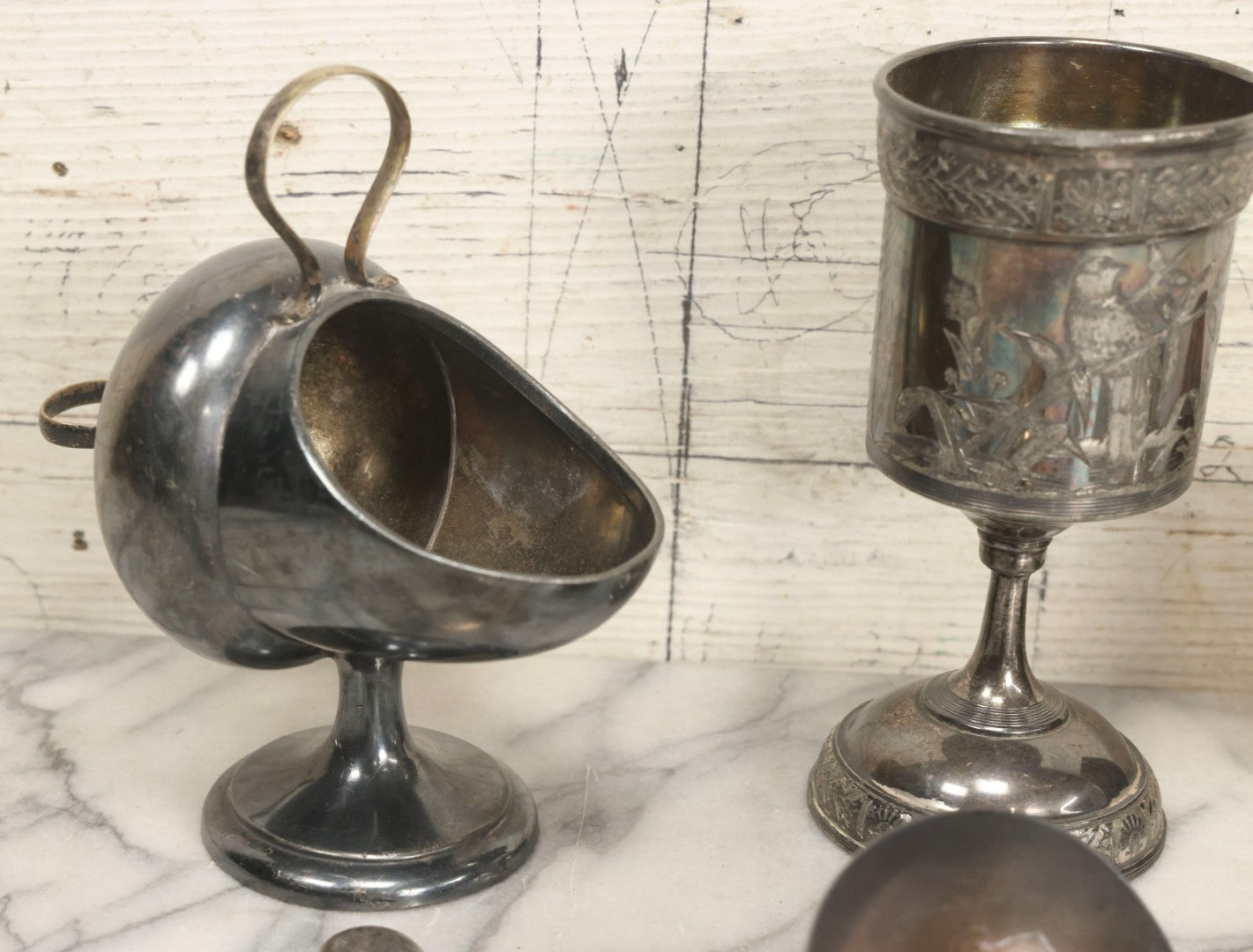 Lot 069 - Eight-Piece Vintage Silverplate Tableware And Accessories Lot Including Engraved Chalice, “The Crumber” Table Sweeper, Sugar Scuttle, Utensils, And 1938-1963 25th Anniversary Presentation Box