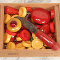Lot 071 - Grouping Of Vintage Red And Yellow Bakelite And Plastic Game Pieces, Knobs, Shifter Knob, Knife, And More, As Found