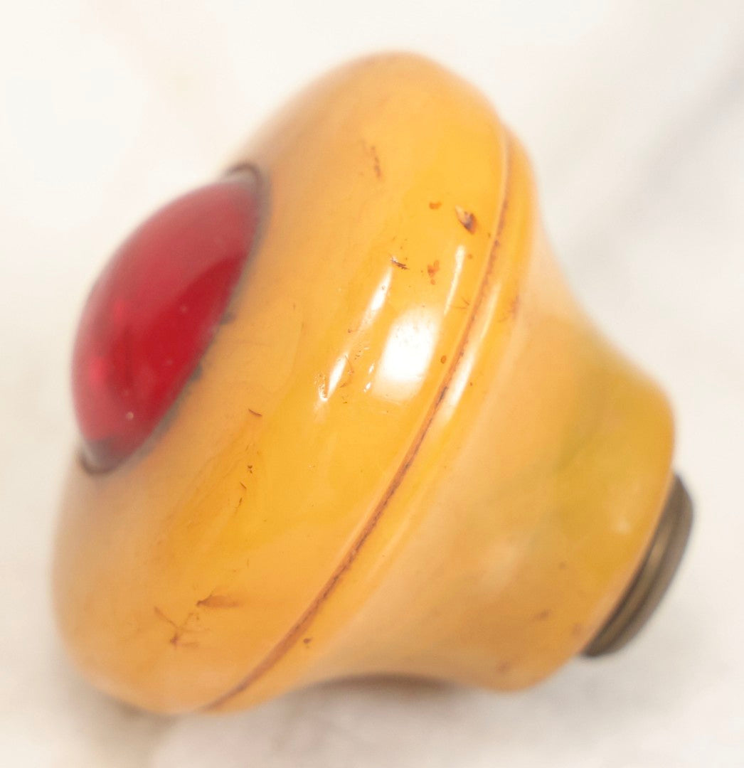 Lot 071 - Grouping Of Vintage Red And Yellow Bakelite And Plastic Game Pieces, Knobs, Shifter Knob, Knife, And More, As Found