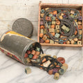 Lot 073 - Grouping Of Vintage Children's Wooden Lacing Blocks And Beads With Cords, Housed In Cigar Box And Royal Baking Powder Tin