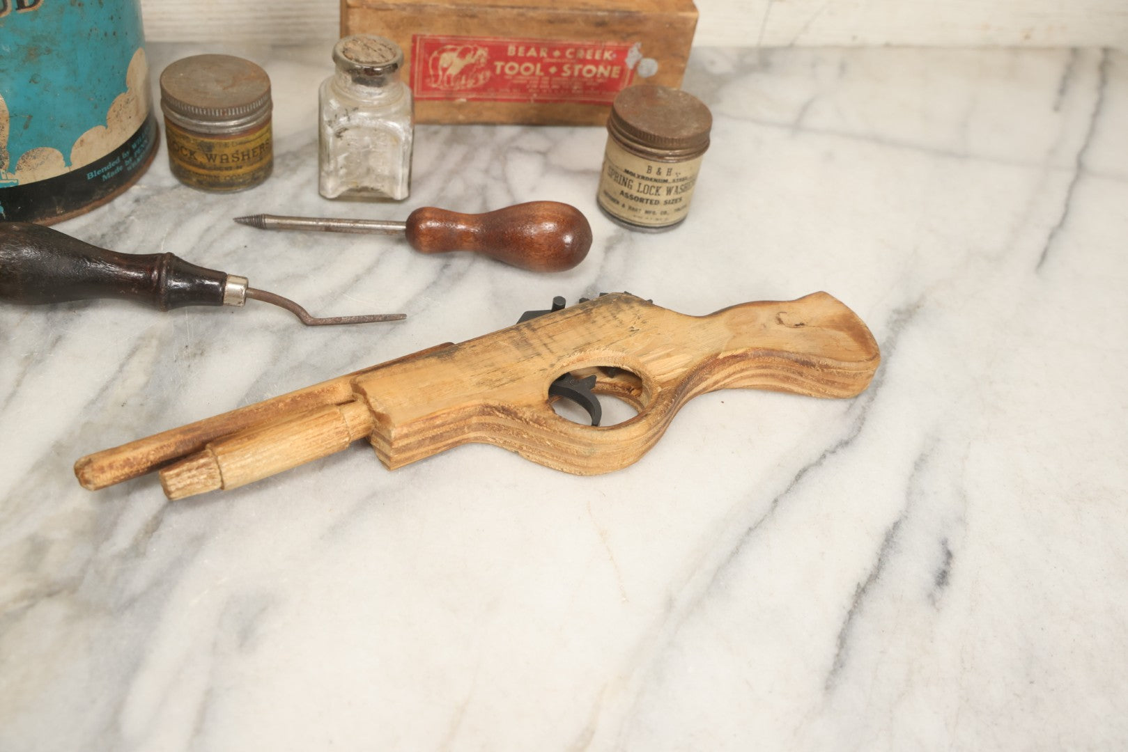 Lot 076 - Grouping Of Ten Mixed Antique And Vintage Smalls Including Kentucky Club Pipe Tobacco Tin, Bear Creek Tool Stone Box, Toy Shotgun, And Hardware