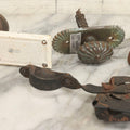 Lot 077 - Grouping Of Four Antique Hardware Items Including Metal Bell, Door Knobs, Escutcheon, And Autodesk Steering Wheel Bracket