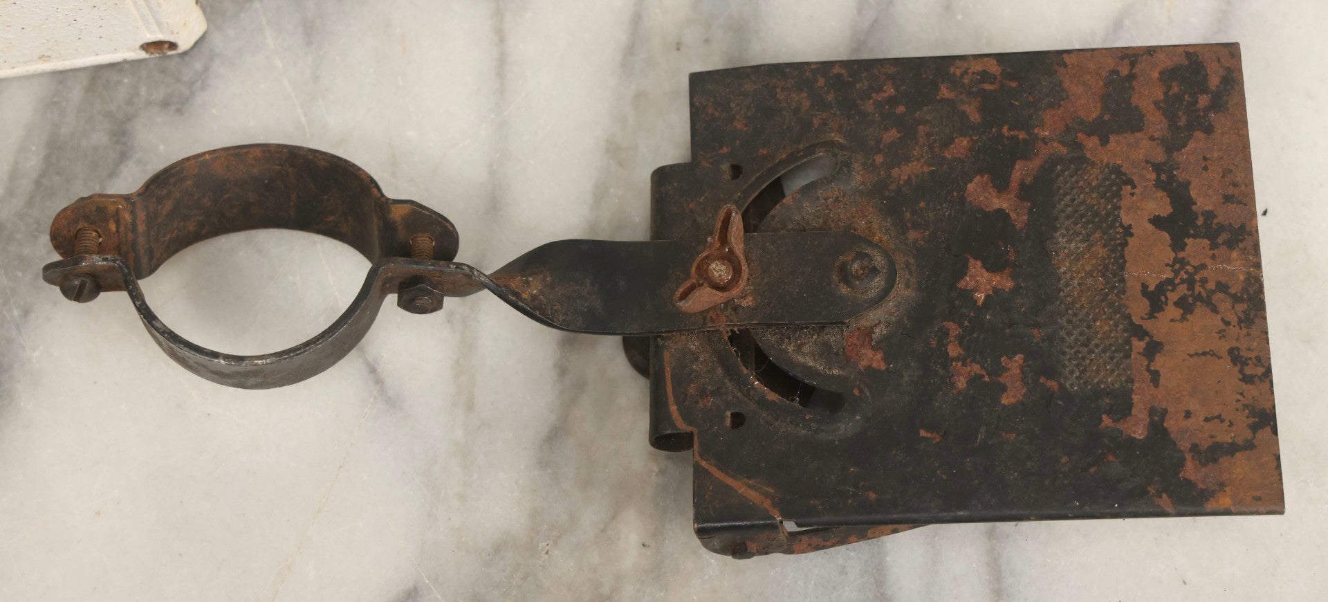 Lot 077 - Grouping Of Four Antique Hardware Items Including Metal Bell, Door Knobs, Escutcheon, And Autodesk Steering Wheel Bracket