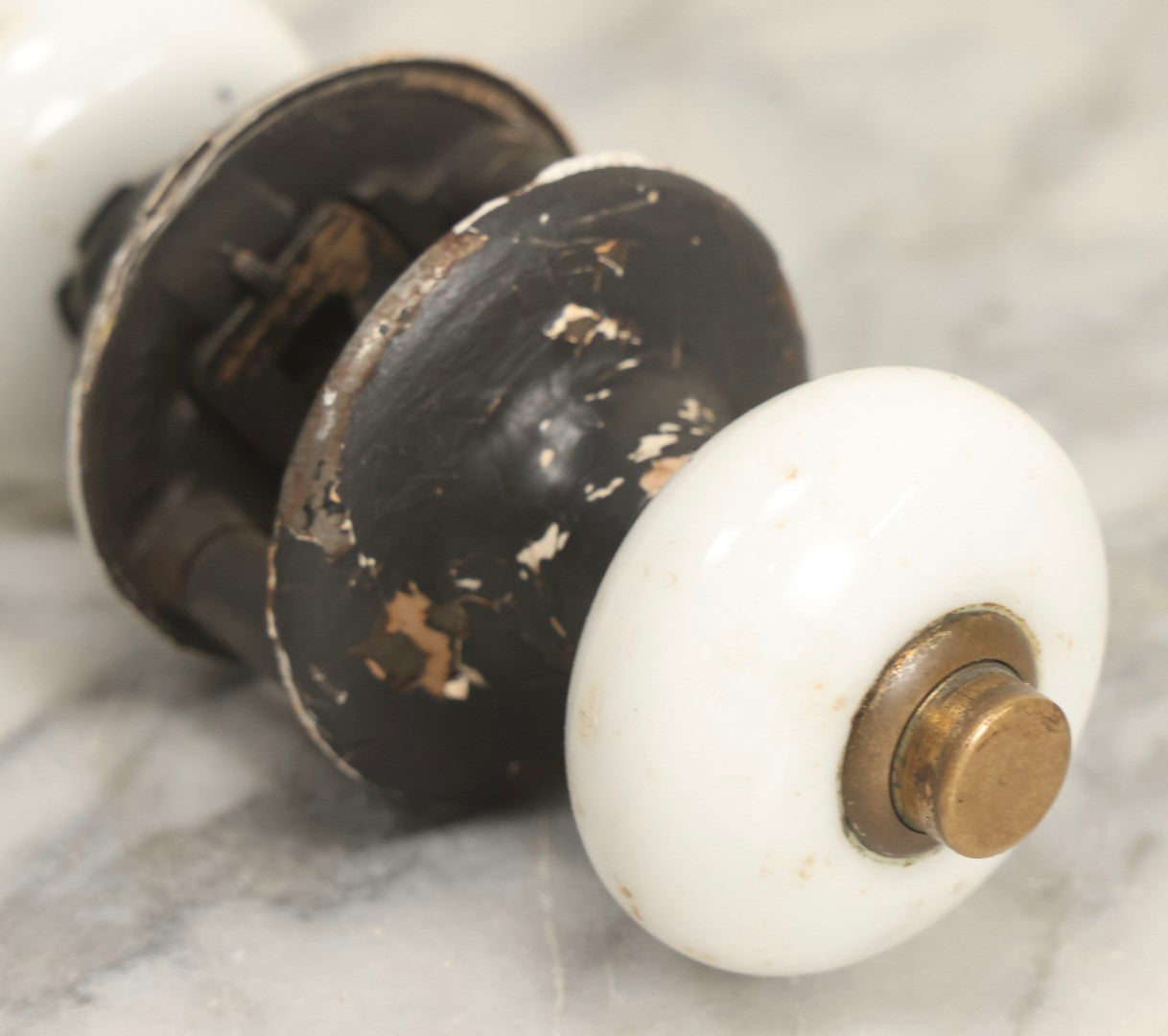Lot 078 - Antique White Porcelain Door Knob Set With Cast Metal Hardware, Rectangle Insert Lockset, And Brass Cylinder
