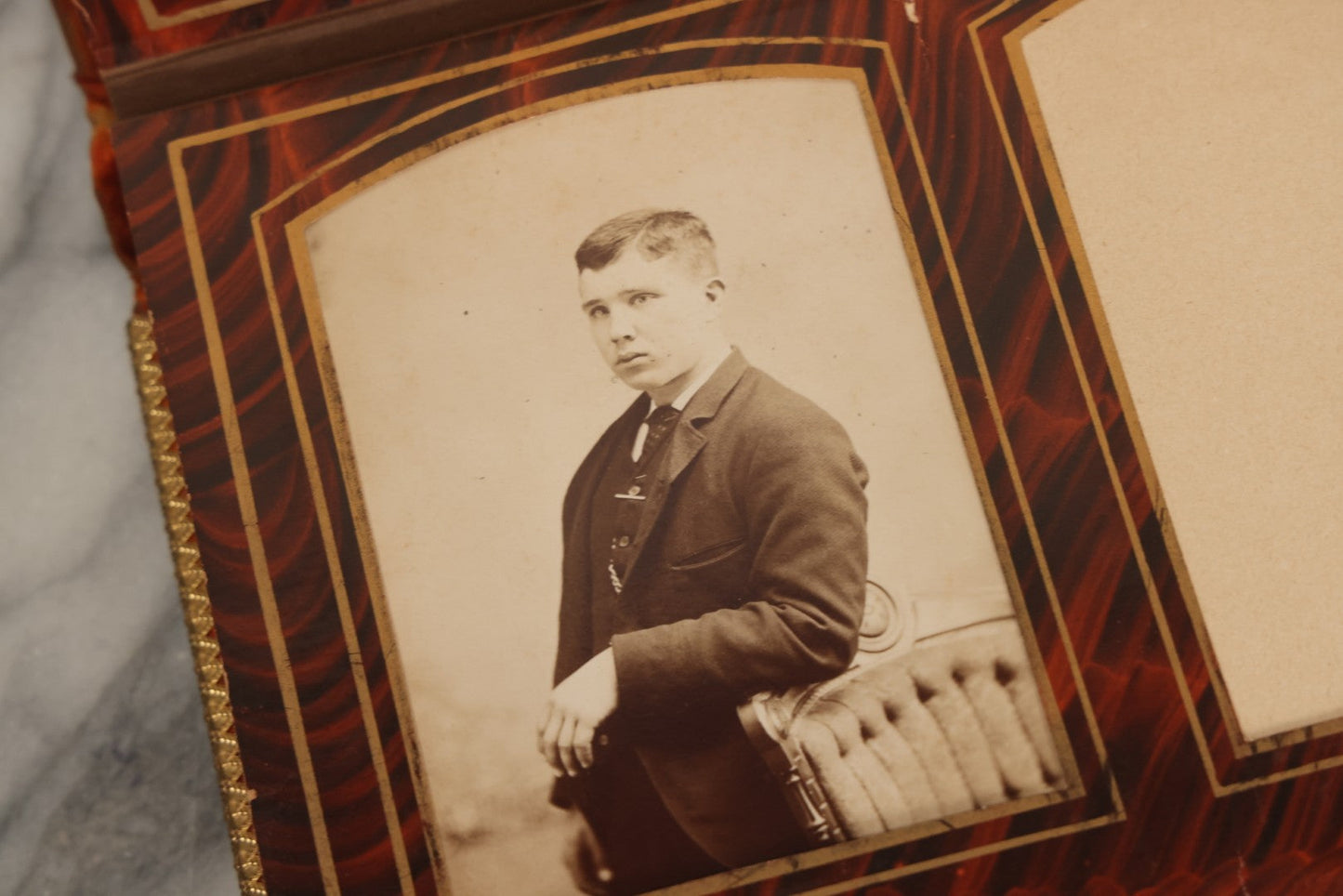 Lot 081 - Antique Cabinet Card And Carte De Visite C.D.V. Photograph Album With 38 Photographs, Brass Pressed Metal Ornaments, Display Stand, Orange And Brown Patterned Crushed Velvet Covers