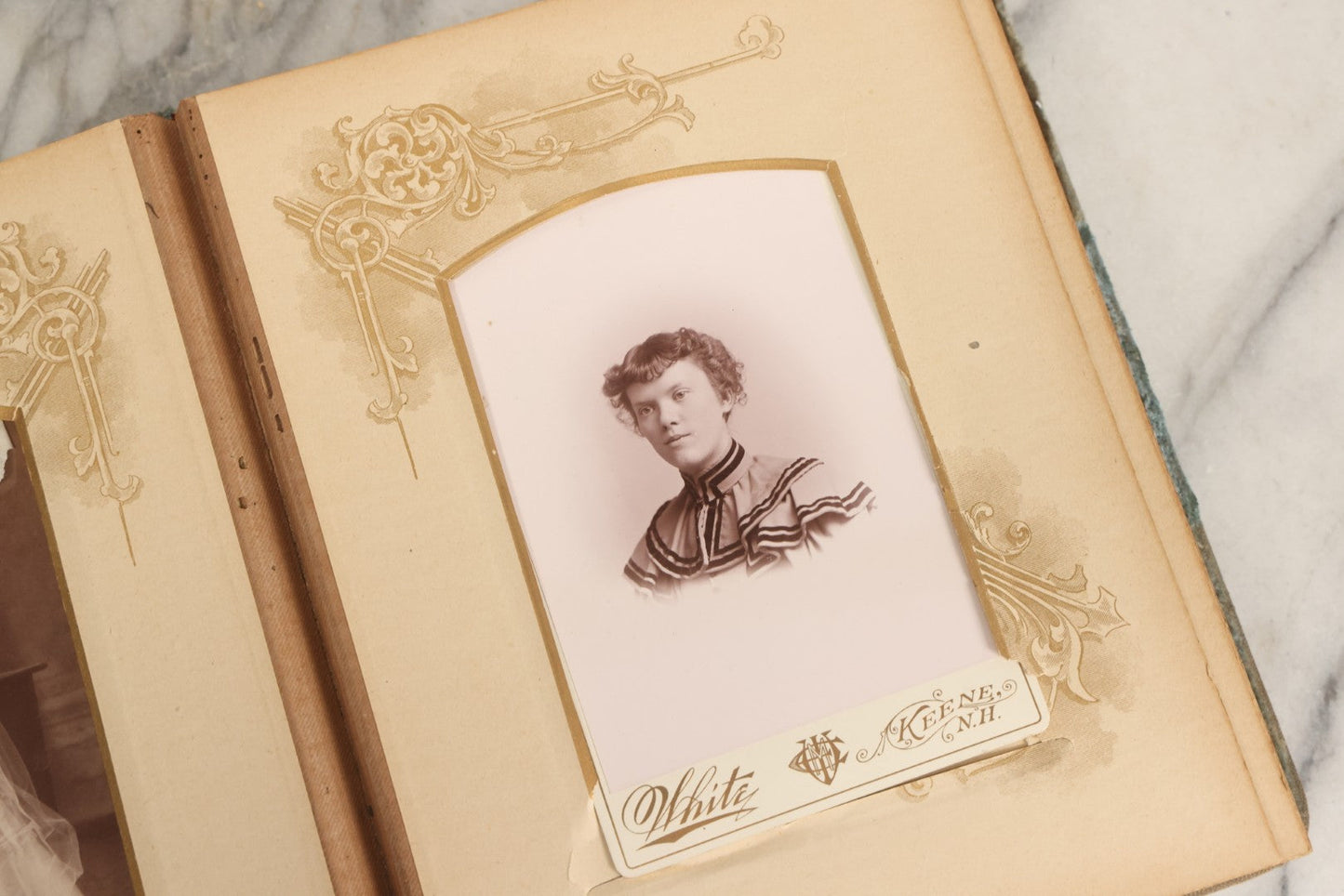 Lot 082 - Antique Cabinet Card And Carte De Visite C.D.V. Photograph Album With 24 Cabinet Card Photographs, Light Blue Velvet Covers With White Celluloid Floral Appliqué, Missing Clasp