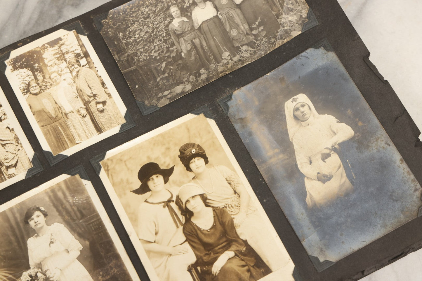 Lot 083 - Vintage Photo Album With Snapshot Photographs From 1920s To 1940s 130+ Photos Including Antique Nurse Real Photo Postcard, WWII Serviceman's Military Service And Family Life, Musicians, Trip To Nyc With Statue Of Liberty