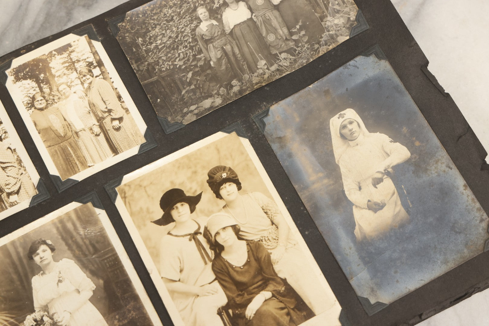 Lot 083 - Vintage Photo Album With Snapshot Photographs From 1920s To 1940s 130+ Photos Including Antique Nurse Real Photo Postcard, WWII Serviceman's Military Service And Family Life, Musicians, Trip To Nyc With Statue Of Liberty