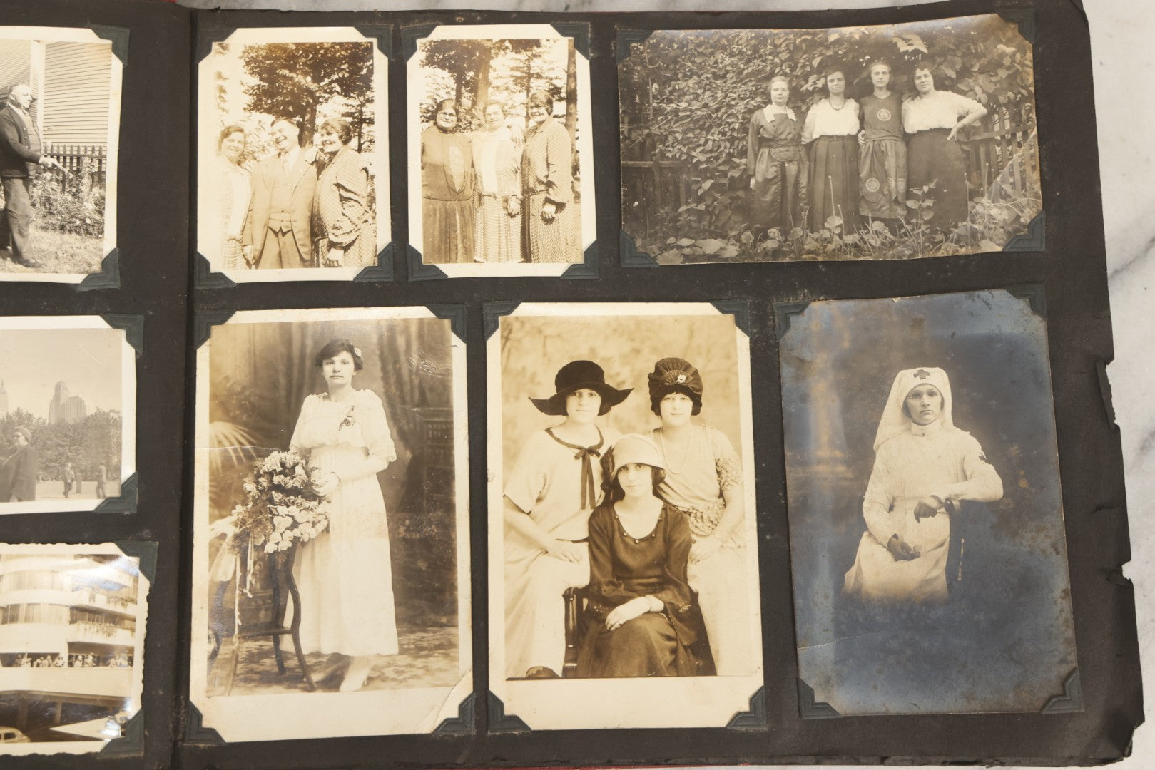 Lot 083 - Vintage Photo Album With Snapshot Photographs From 1920s To 1940s 130+ Photos Including Antique Nurse Real Photo Postcard, WWII Serviceman's Military Service And Family Life, Musicians, Trip To Nyc With Statue Of Liberty