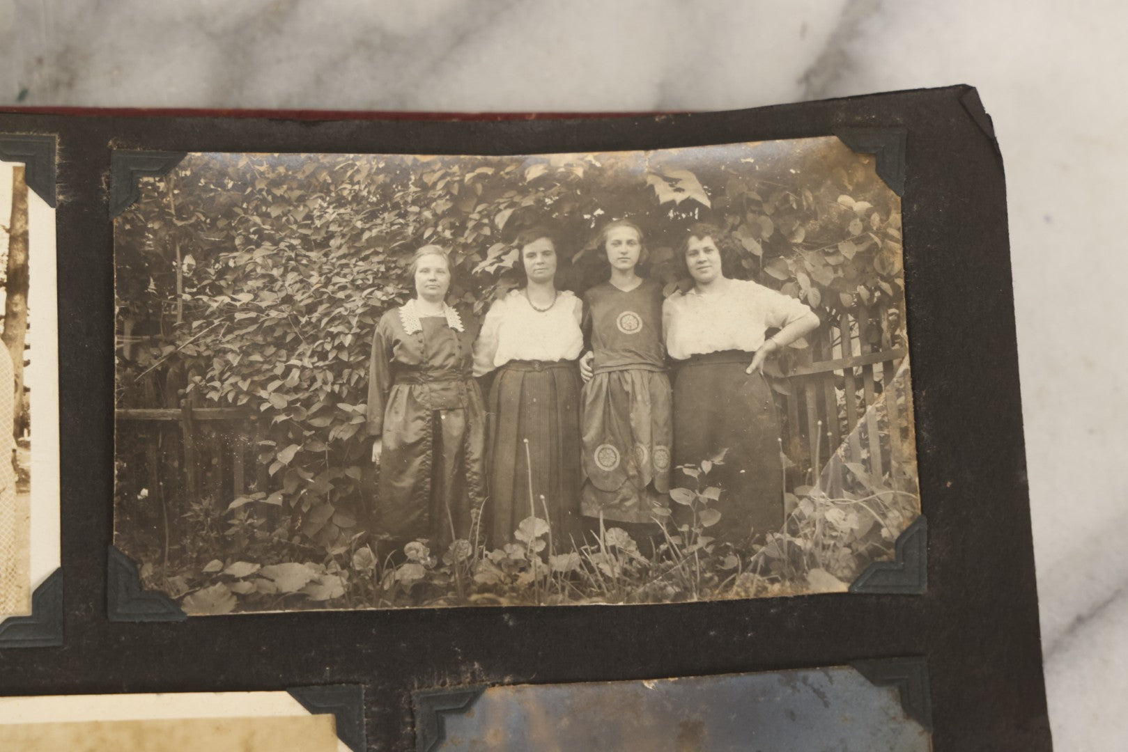 Lot 083 - Vintage Photo Album With Snapshot Photographs From 1920s To 1940s 130+ Photos Including Antique Nurse Real Photo Postcard, WWII Serviceman's Military Service And Family Life, Musicians, Trip To Nyc With Statue Of Liberty