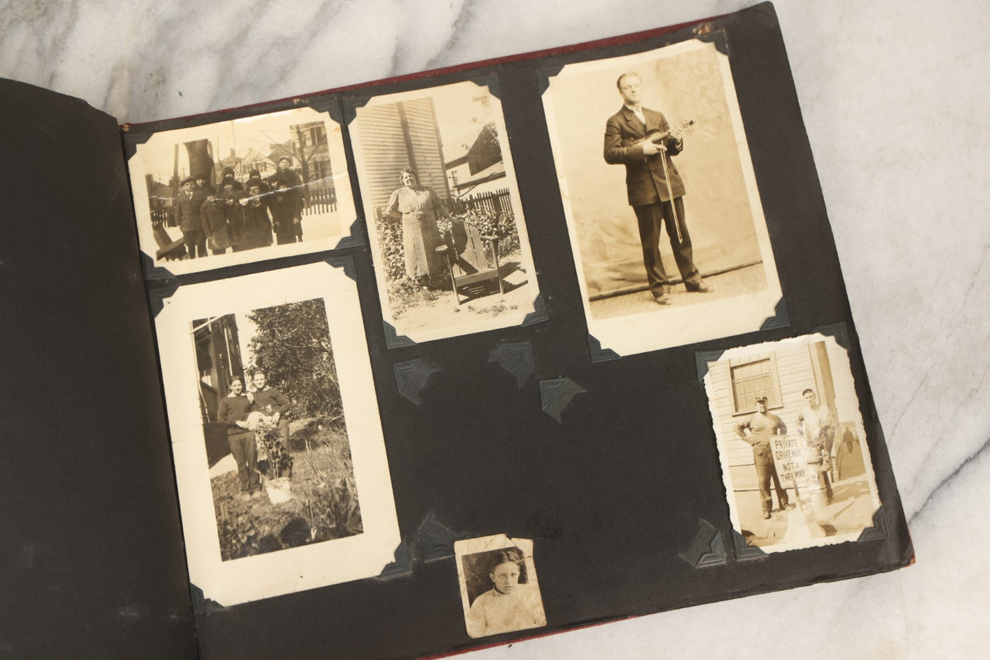Lot 083 - Vintage Photo Album With Snapshot Photographs From 1920s To 1940s 130+ Photos Including Antique Nurse Real Photo Postcard, WWII Serviceman's Military Service And Family Life, Musicians, Trip To Nyc With Statue Of Liberty