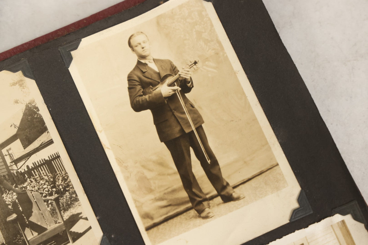 Lot 083 - Vintage Photo Album With Snapshot Photographs From 1920s To 1940s 130+ Photos Including Antique Nurse Real Photo Postcard, WWII Serviceman's Military Service And Family Life, Musicians, Trip To Nyc With Statue Of Liberty