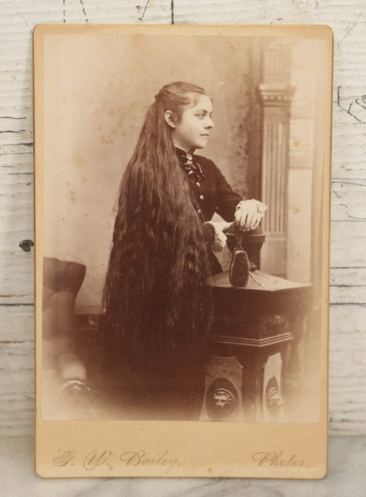 Lot 084 - Antique Cabinet Card Photograph Of Young Woman With Long Dark Hair Holding Hairbrush, F W Bailey Photos