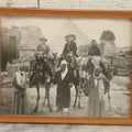 Lot 088 - Vintage Black And White Tourism Photograph Of Three Tourists On Camels At The Giza Pyramids With Great Sphinx, Egypt, In Modern Frame