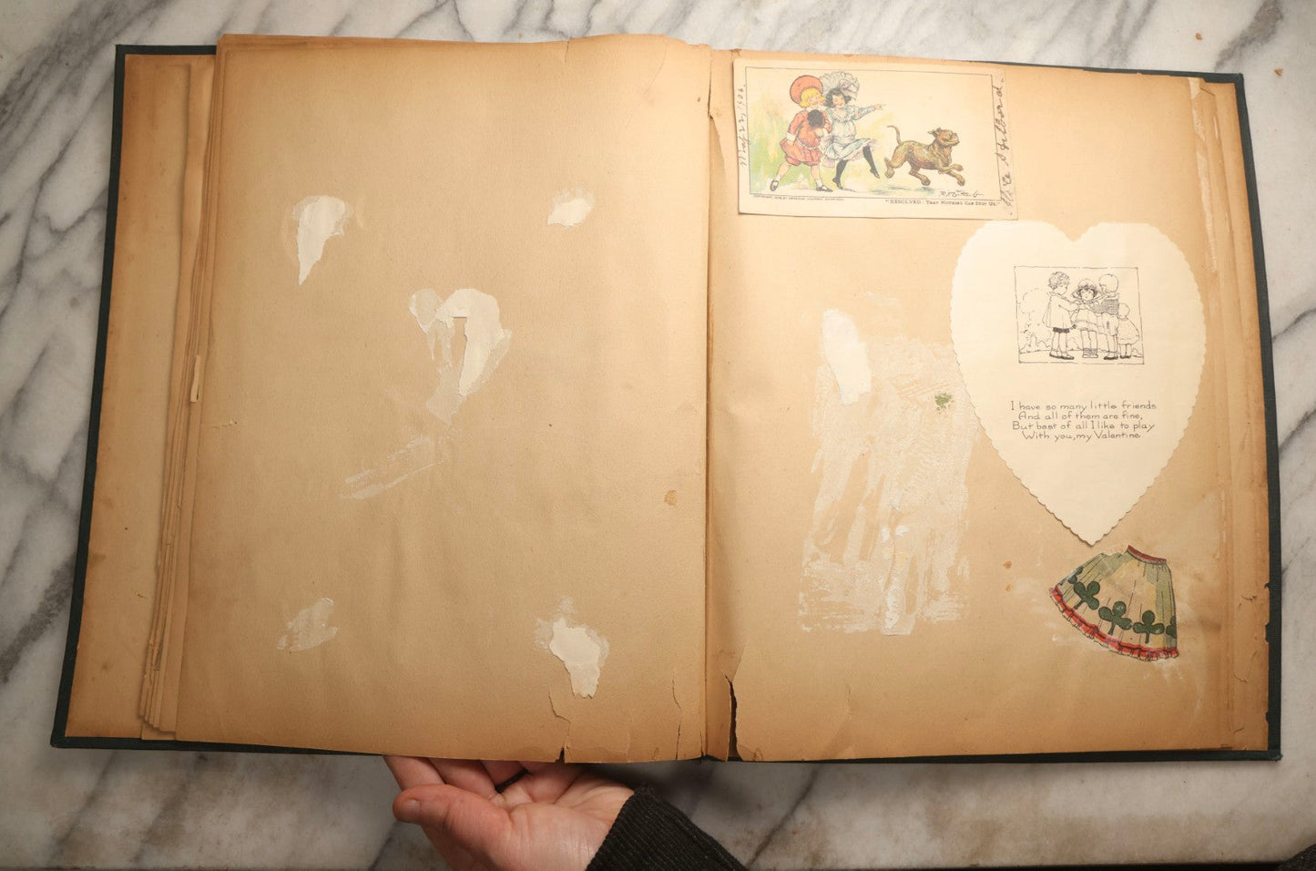 Lot 096 - Antique "The Nonpareil" Scrapbook, Puppies Illustration On Cover, With 100+ Trade Cards, Die Cuts, And Greeting Cards Featuring Children, Butterflies, And Flowers, Circa 1900-1906, Note Binding Detached