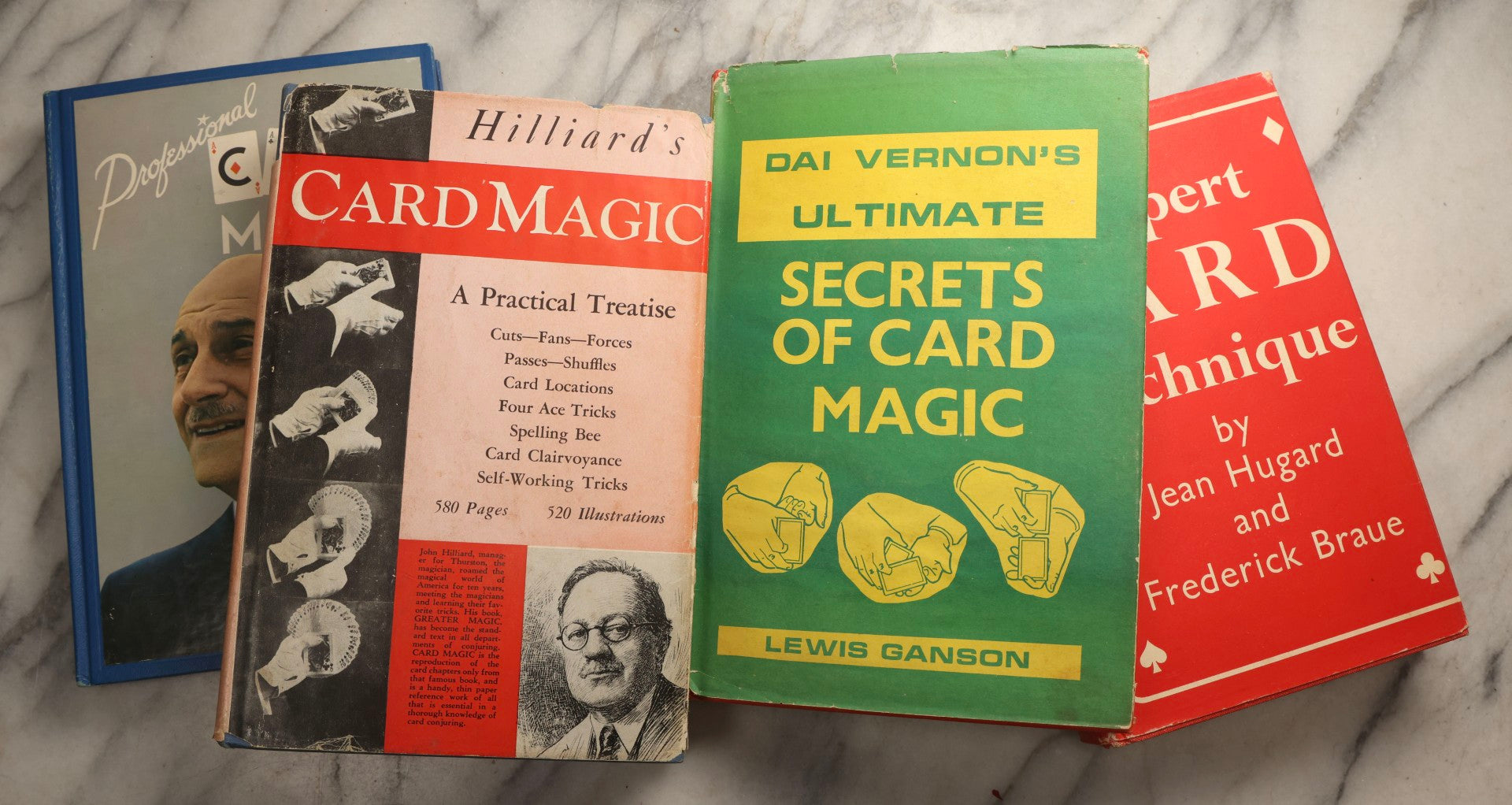 Lot 102 - Grouping Of Four Vintage Card Magic Books Including "Expert Card Technique" By Hugard And Braue, "Dai Vernon's Ultimate Secrets Of Card Magic," "Hillard's Card Magic," And "Professional Card Magic" By Cliff Green