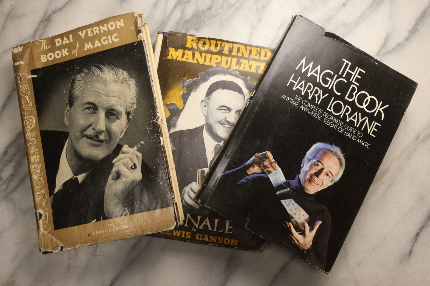 Lot 105 - Grouping Of Three Vintage Magic Books With Dust Jackets Including "The Magic Book" By Harry Lorayne, "The Dai Vernon Book Of Magic" By Lewis Ganson, And "Routined Manipulation Finale" By Lewis Ganson, Circa 1960s-1970s