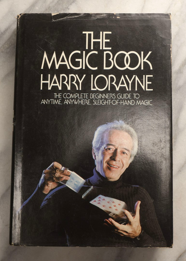 Lot 105 - Grouping Of Three Vintage Magic Books With Dust Jackets Including "The Magic Book" By Harry Lorayne, "The Dai Vernon Book Of Magic" By Lewis Ganson, And "Routined Manipulation Finale" By Lewis Ganson, Circa 1960s-1970s