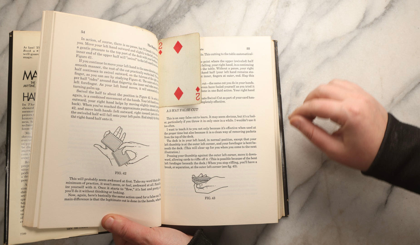 Lot 105 - Grouping Of Three Vintage Magic Books With Dust Jackets Including "The Magic Book" By Harry Lorayne, "The Dai Vernon Book Of Magic" By Lewis Ganson, And "Routined Manipulation Finale" By Lewis Ganson, Circa 1960s-1970s