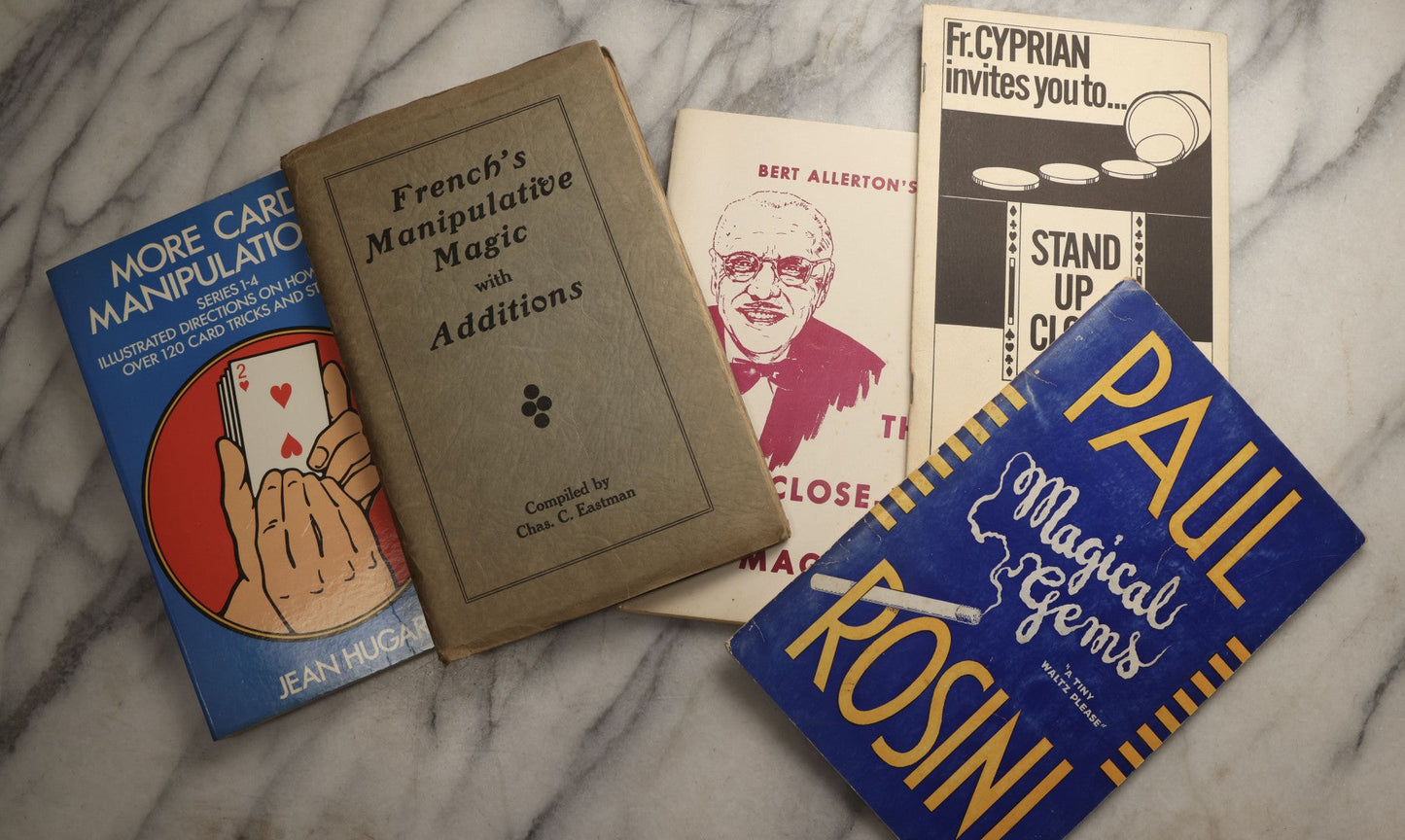 Lot 107 - Grouping Of Five Vintage Magic Paperbacks And Booklets Including "The Close-Up Magician," "Stand Up Close," "French's Manipulative Magic With Additions," "More Card Manipulations" By Jean Hugard, And "Paul Rosini Magical Gems: A Memorial"
