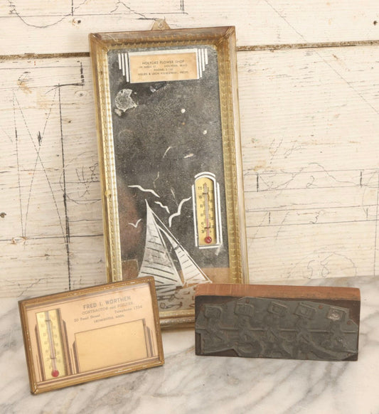 Lot 118 - Grouping Of Three Vintage Advertising Items Including M.A.C. Clubs Rubber Stamp, Fred I. Worthen Thermometer, And Holyoke Flower Shop Thermometer