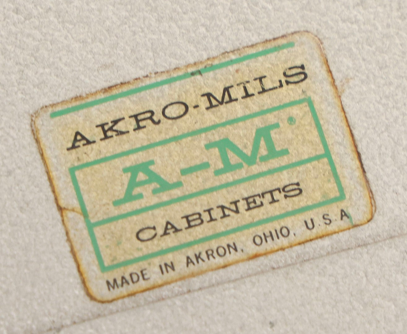 Lot 123 - Vintage A-M Cabinets Silver Metal 21-Drawer Parts Organizer With Original Paper Advertising And Labeling Supplies, Manufactured By Akro-Mils, Akron, Ohio