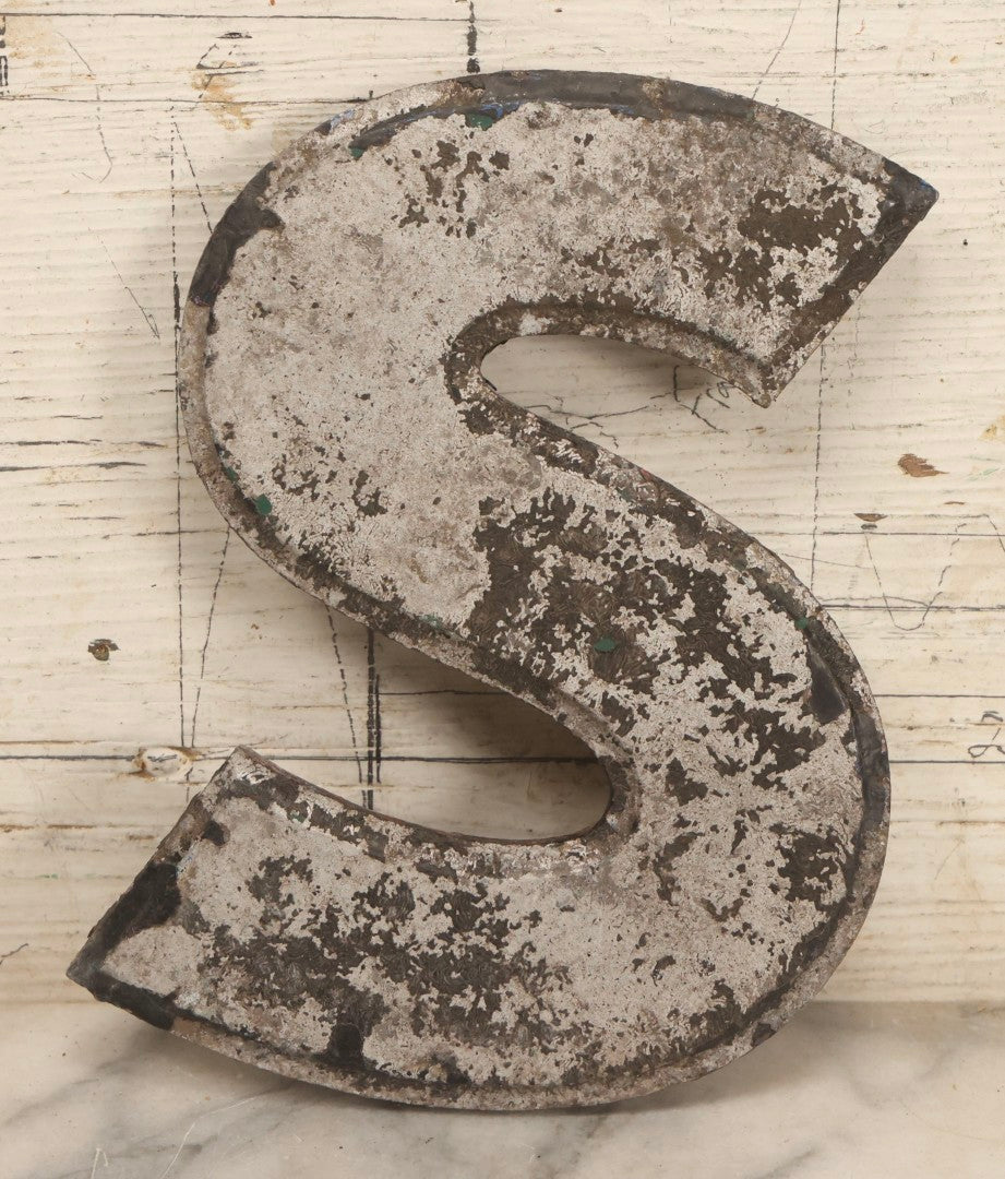 Lot 129 - Vintage Metal Letter S Sign With Heavy Surface Wear And Black Paint Remnants, Worn Maker And Patent Mark On Verso